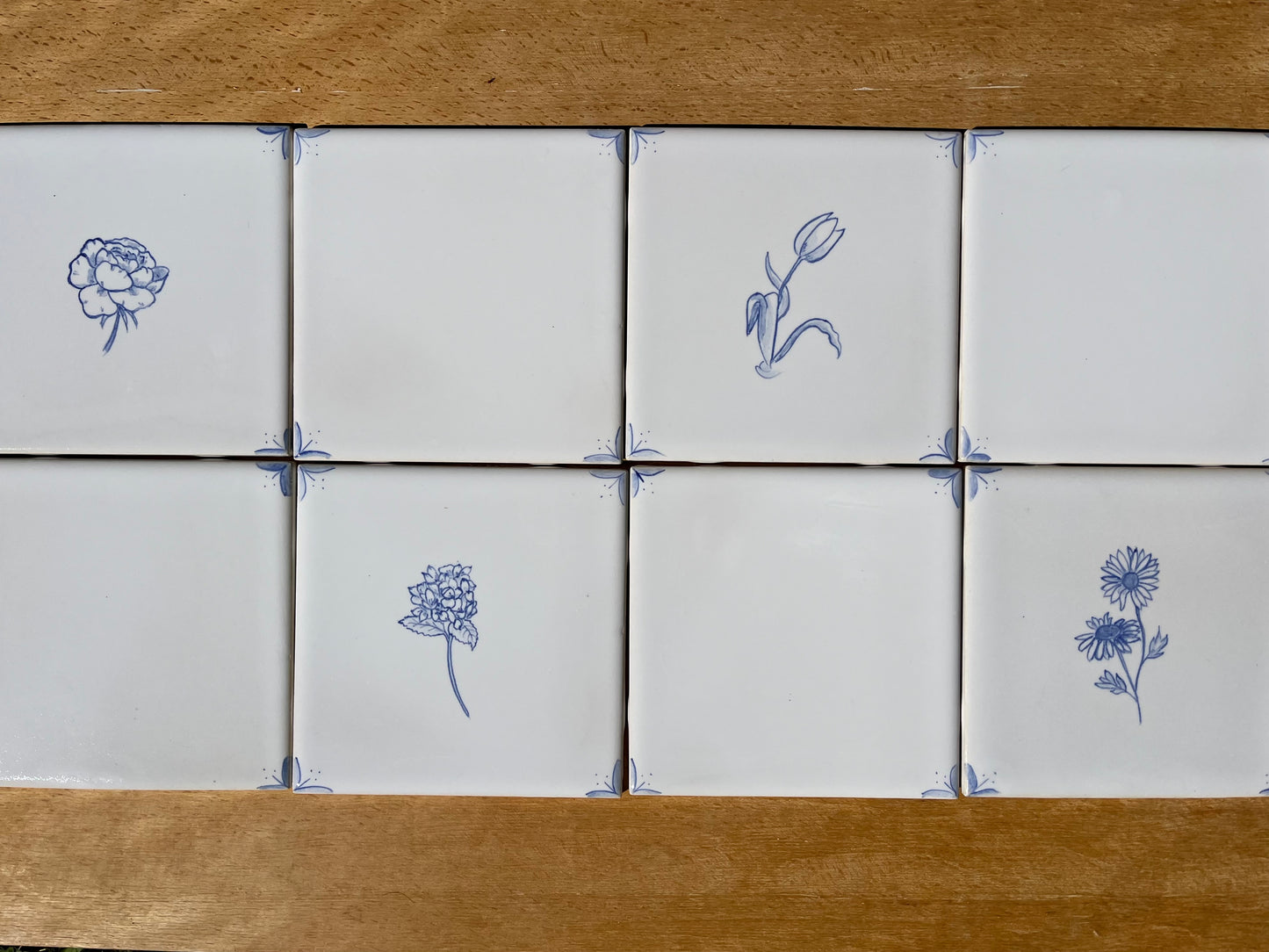 Set of eight 6" hand painted tiles: tulip, daisy, peony, and hydrangea, with spacers