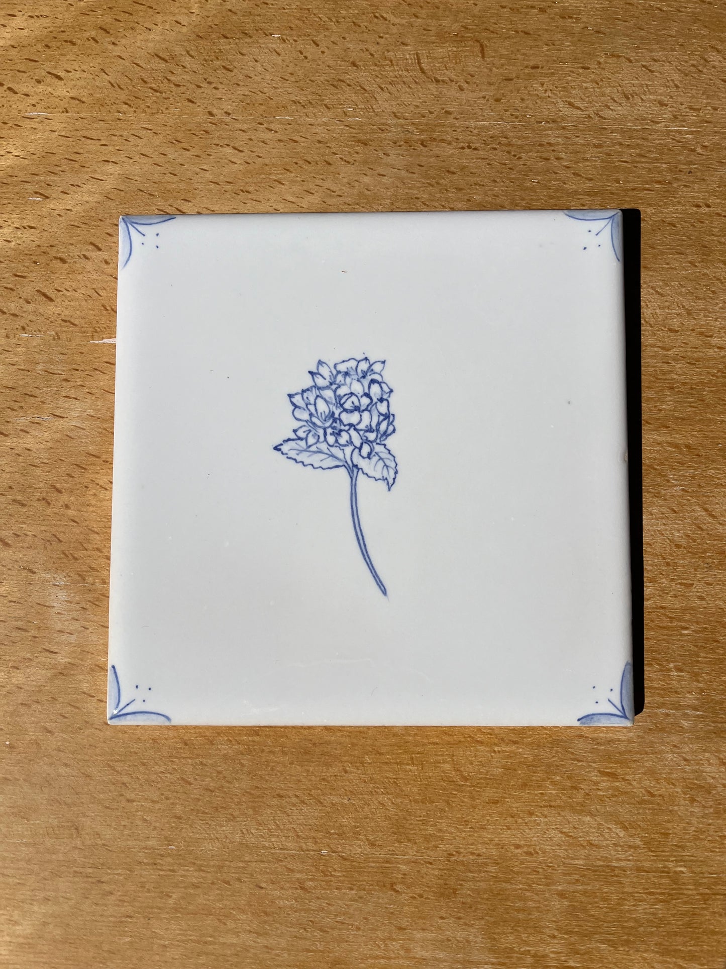 Set of eight 6" hand painted tiles: tulip, daisy, peony, and hydrangea, with spacers